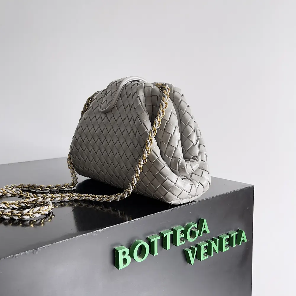 Side angle showing compact silhouette of Bottega Veneta Small Lauren 1980-Silver