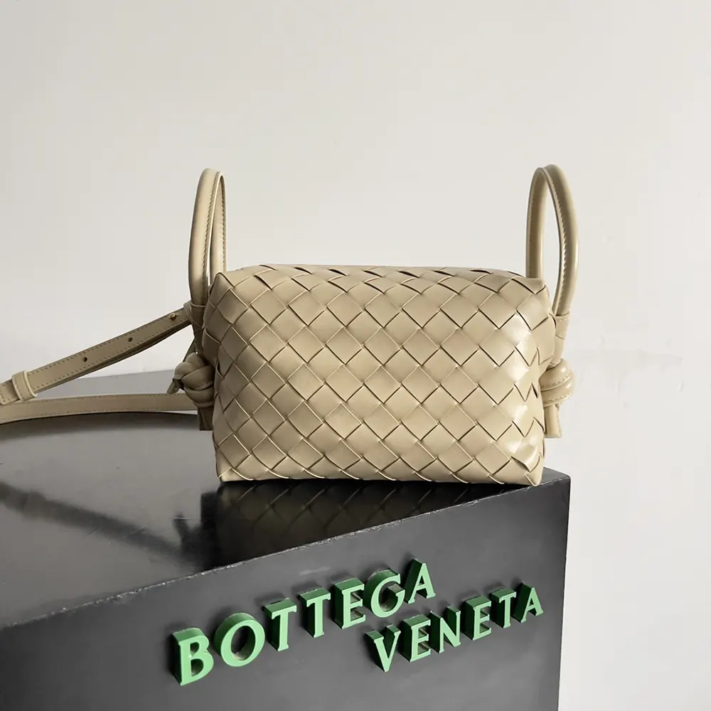 Close-up of woven Intrecciato leather texture on Bottega Veneta handbag
