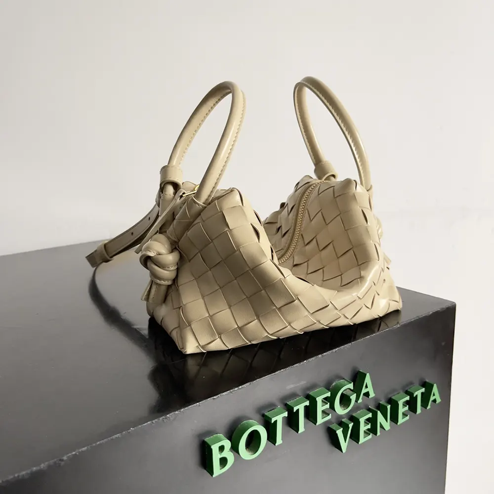 Side angle showing gold hardware detail on Bottega Veneta Top Handle Loop