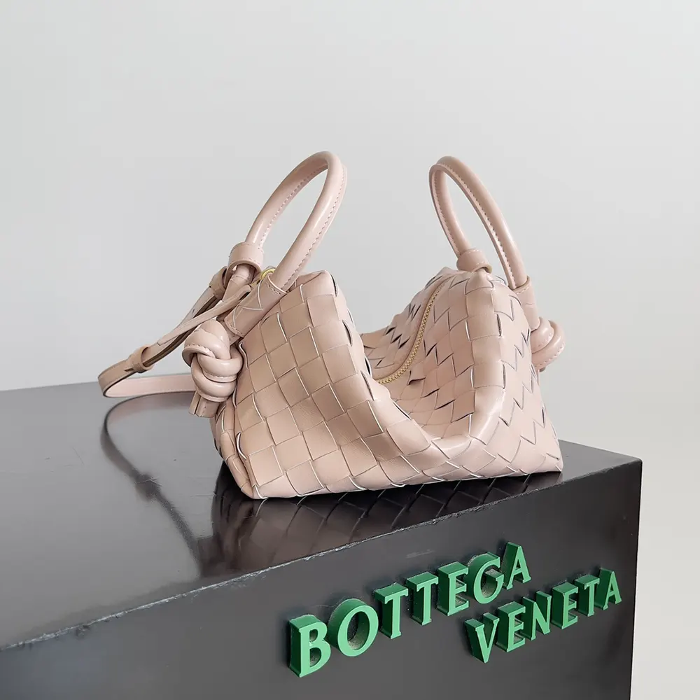 Side angle showing structured silhouette of Bottega Veneta Women Top Handle Loop