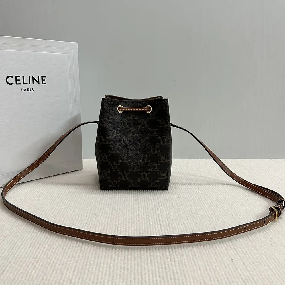 Side angle showing adjustable strap and calfskin trim on Celine Women Micro Sailor