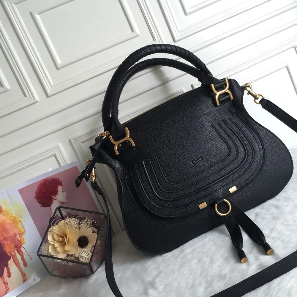 Close-up of knotted saddle hardware on Chloe Women Marcie Bag