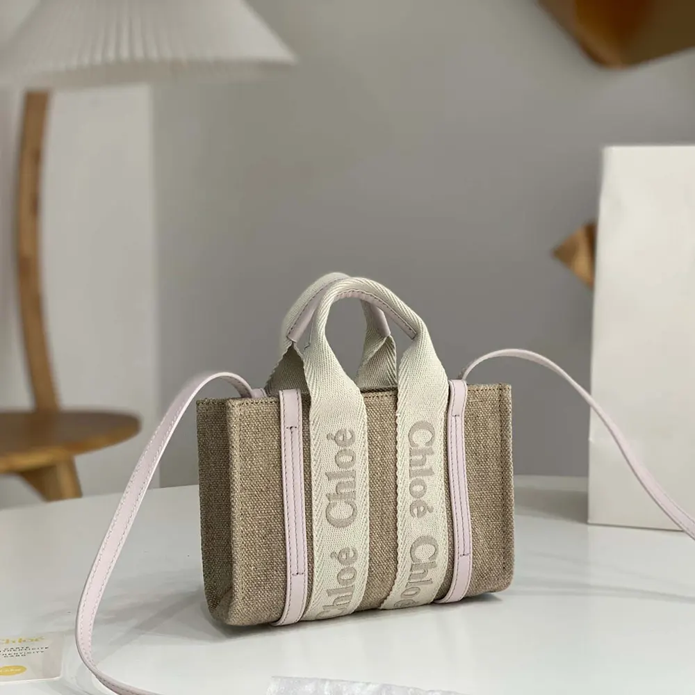 Side angle showing compact silhouette of Chloe Women Mini Woody Tote Bag