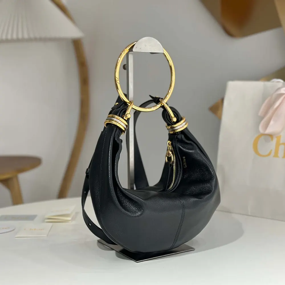 Side view showing compact silhouette of Chloe Women Small Bracelet Hobo Bag