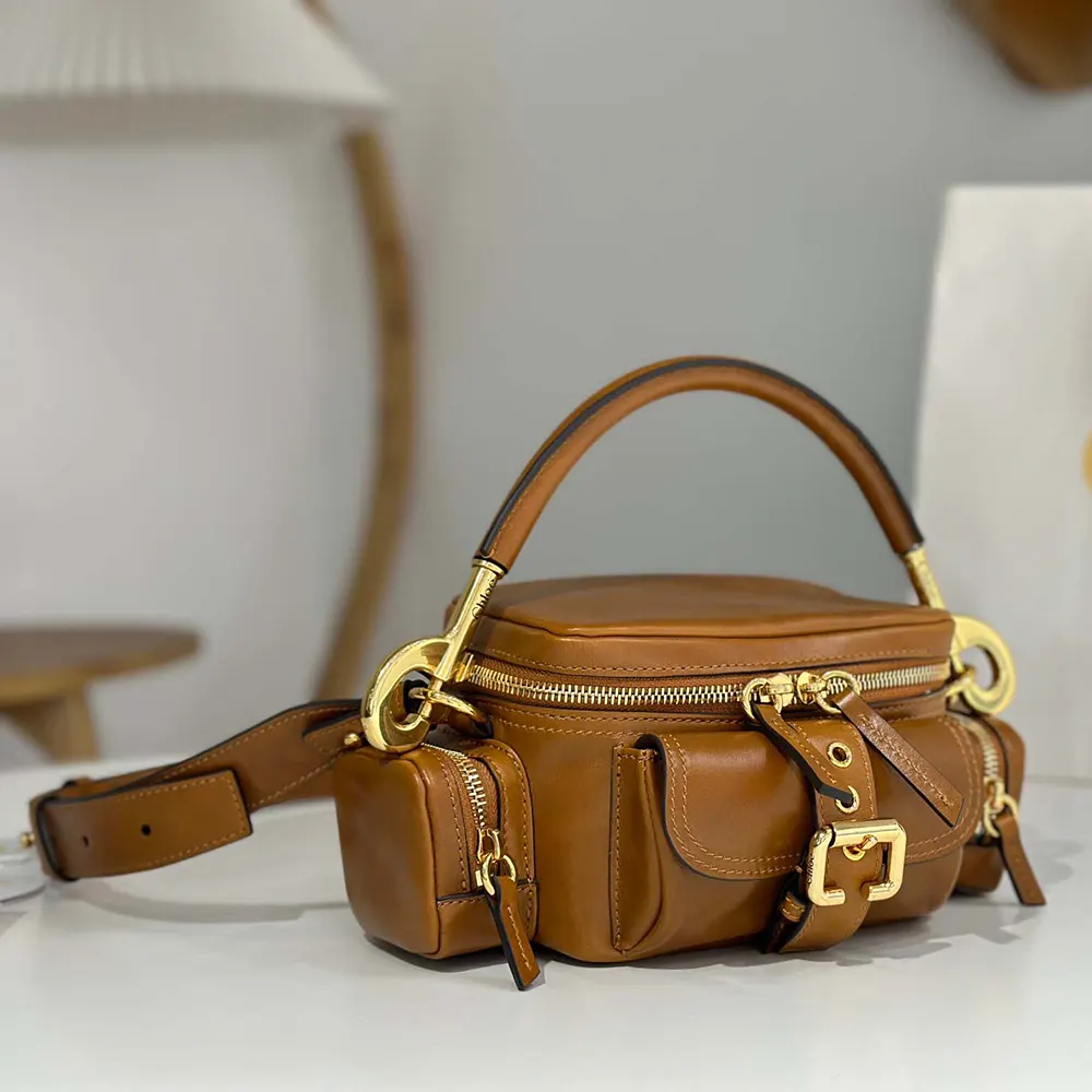Side angle showing adjustable strap and textured leather of Chloe Women Small Camera Bag