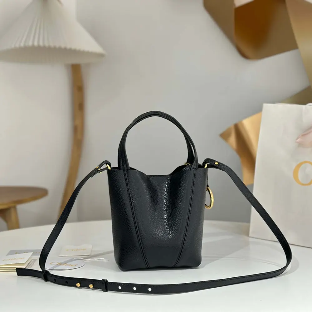 Side angle showing compact silhouette of Chloe Women Small Chloé Spin Tote Bag