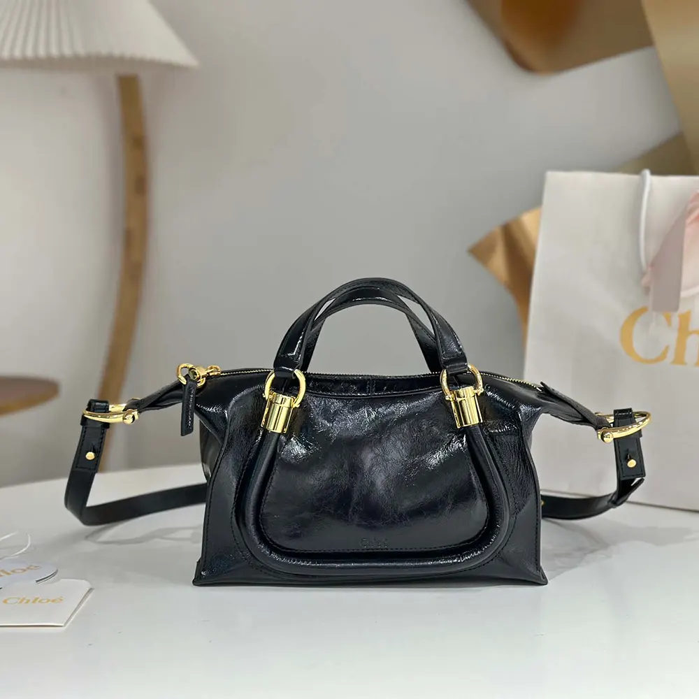 Close-up of gold-tone hardware and signature flap on Chloe Paraty 24 bag