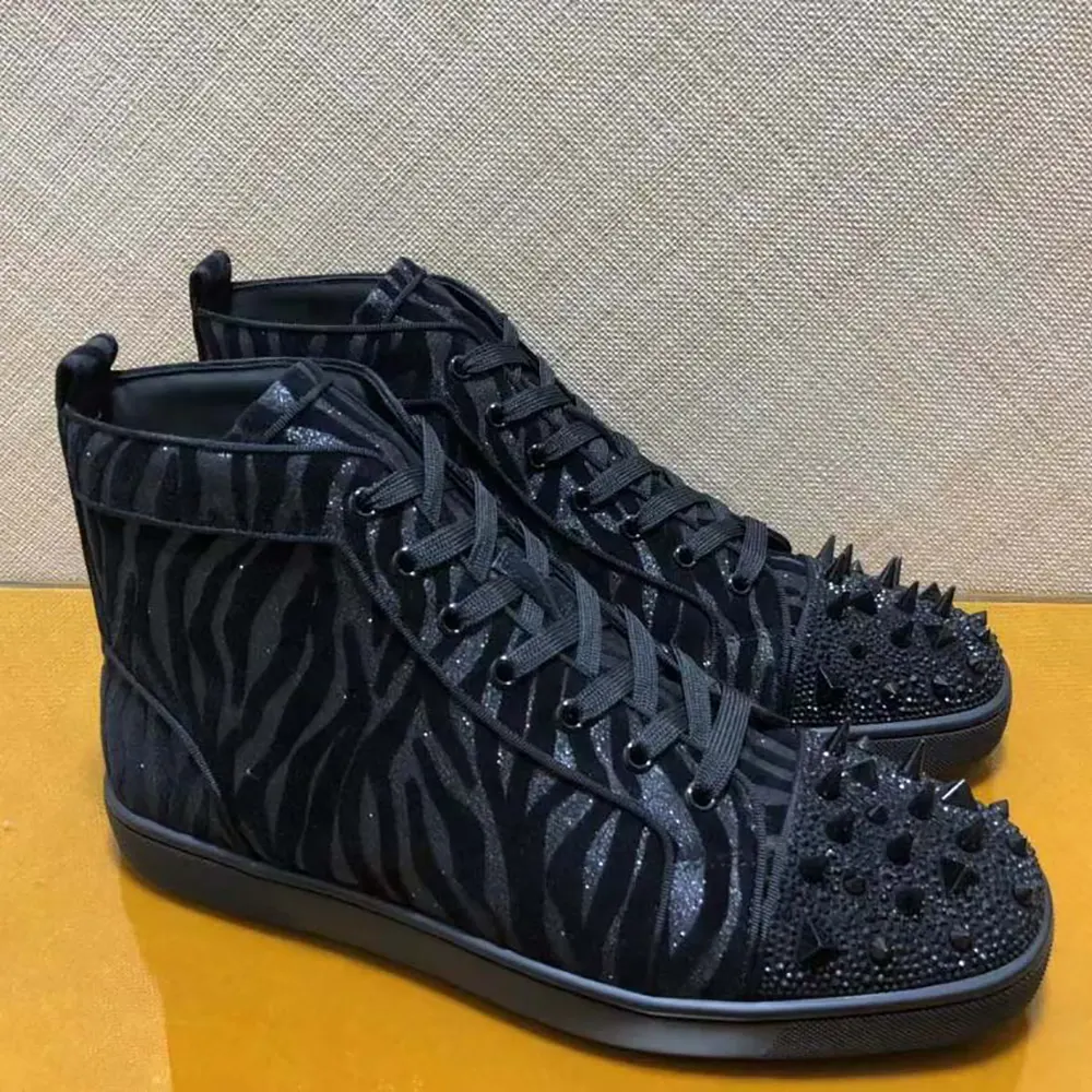 Close-up of signature red sole and Pik Pik studs on Christian Louboutin sneakers