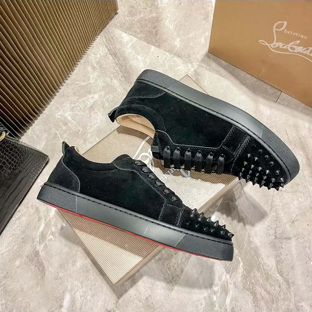 Overhead shot highlighting red sole of Christian Louboutin Louis Junior Spikes Sneakers