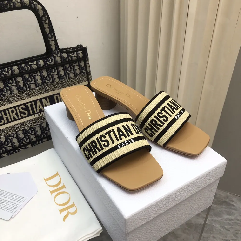 Close-up of black embroidered cotton on Dior Women Dway Heeled Slide
