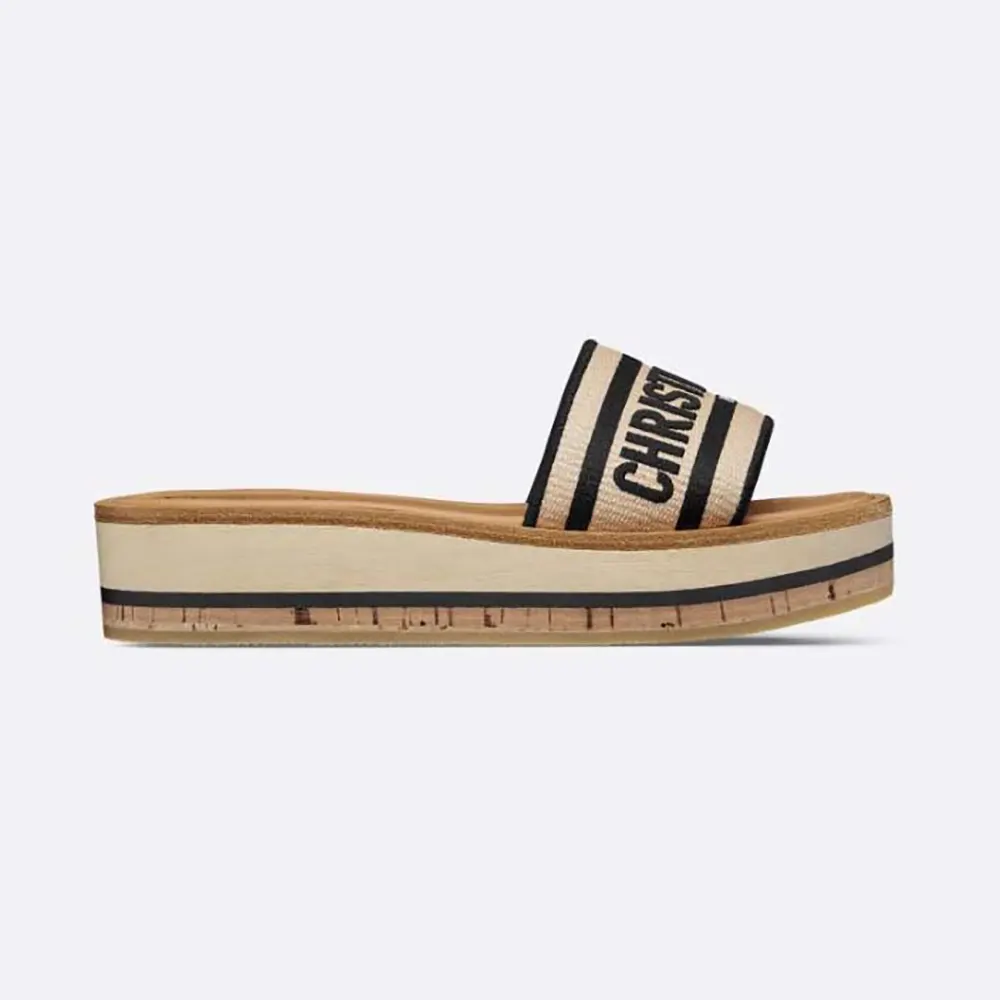 Side profile of Dior Women Dway Platform Slide with natural raffia and black embroidery