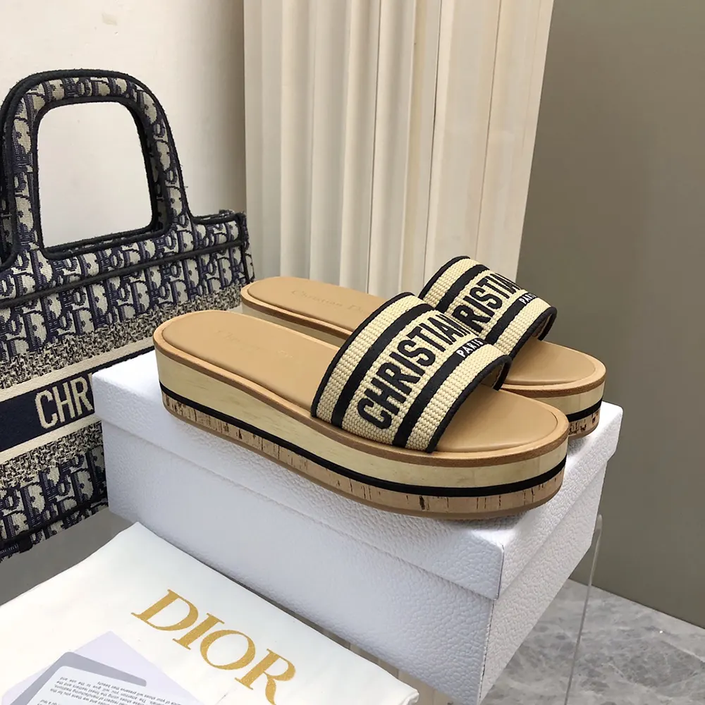 Close-up of black embroidered cotton detail on Dior Women Dway Platform Slide