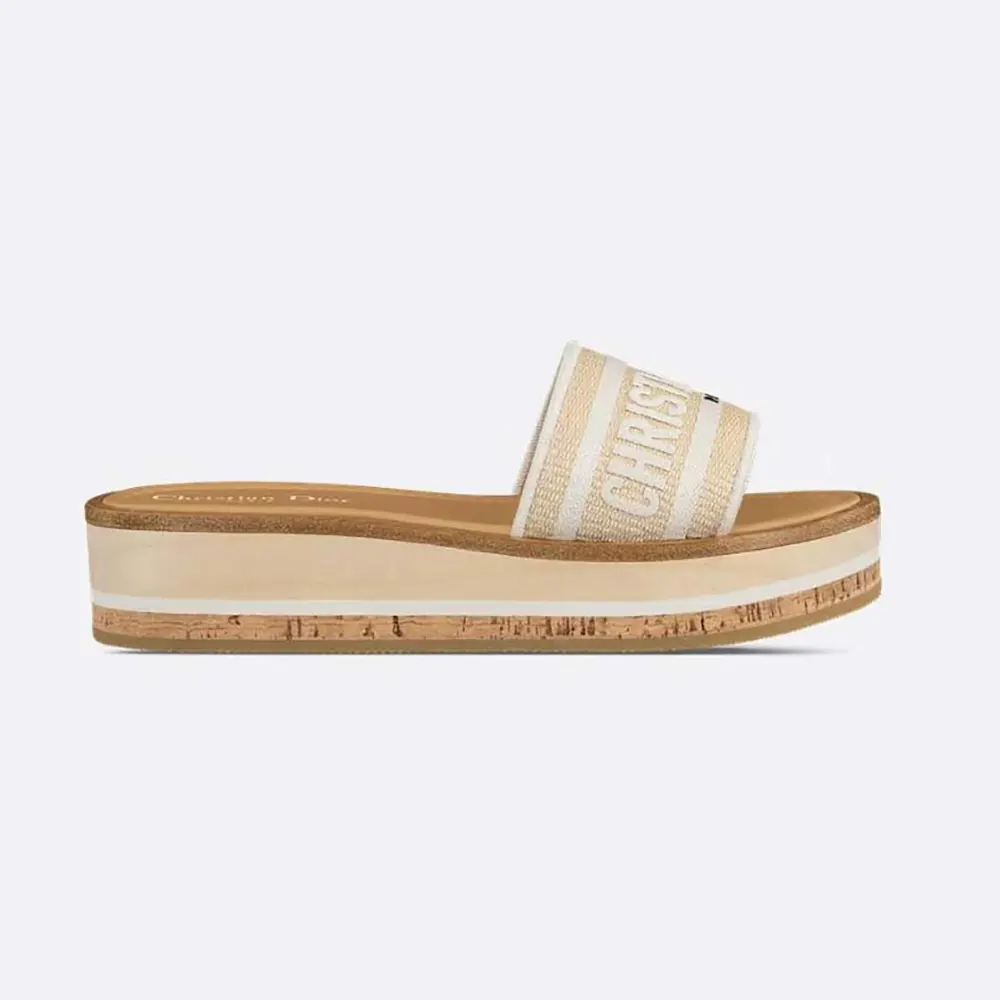 Side view of Dior Women Dway Platform Slide with natural raffia and white embroidery