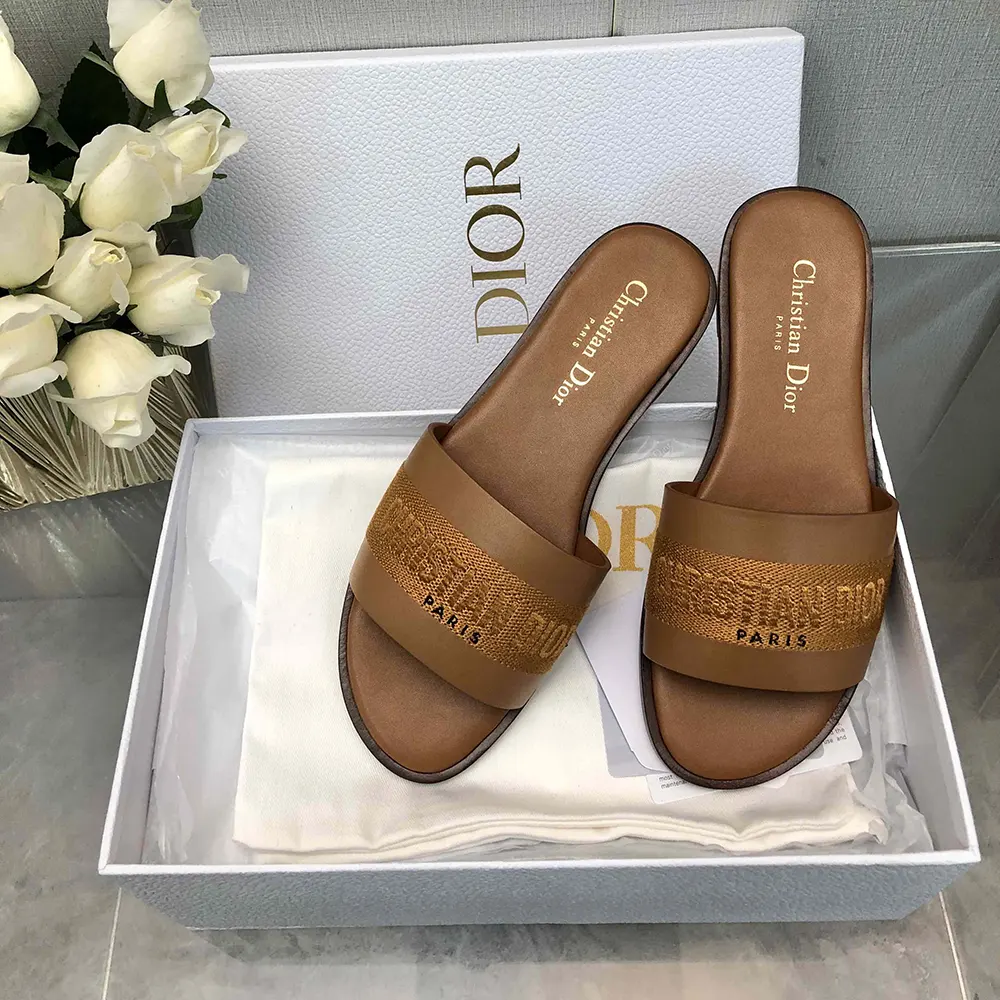 Close-up of embroidered cotton detail on Dior Women Dway Slide sandal