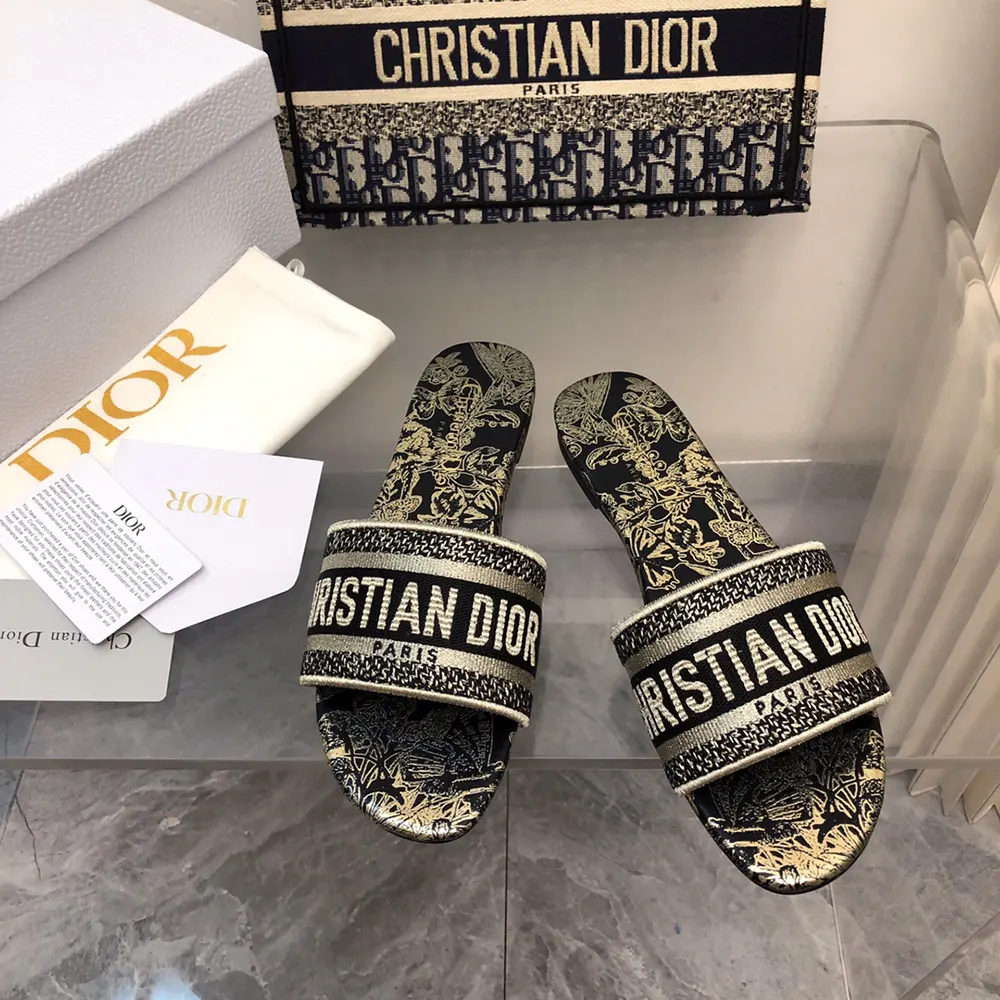 Close-up on metallic thread embroidery of Dior Women Dway Slide in black