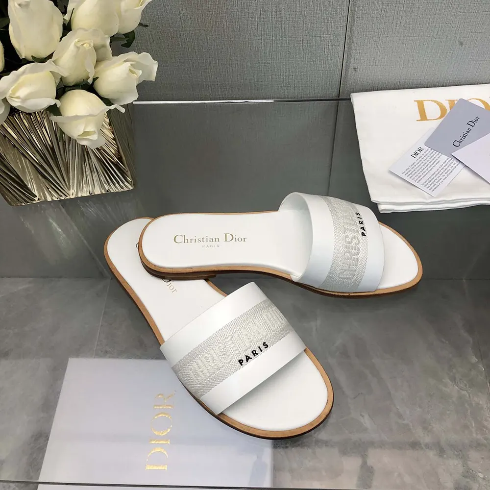 Top view showing white calfskin and stitching on Dior Women Dway Slide