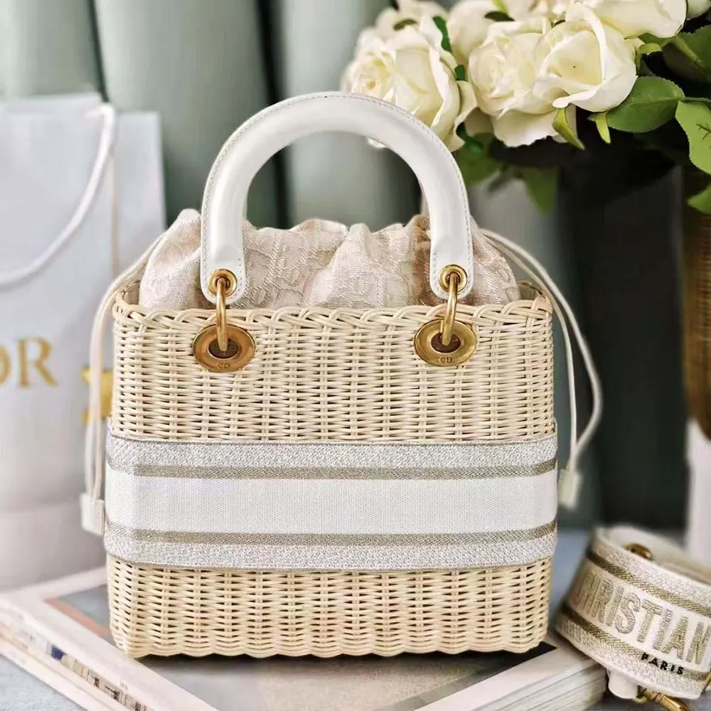 Side angle showing structured silhouette of Dior Women Medium Lady Dior Bag