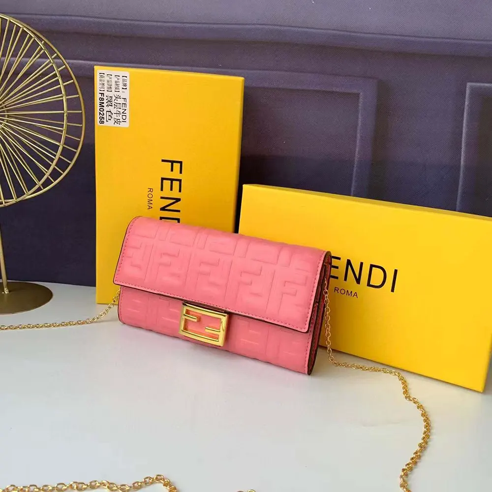 Close-up of gold-tone chain and hardware on Fendi Pink Nappa Leather Wallet