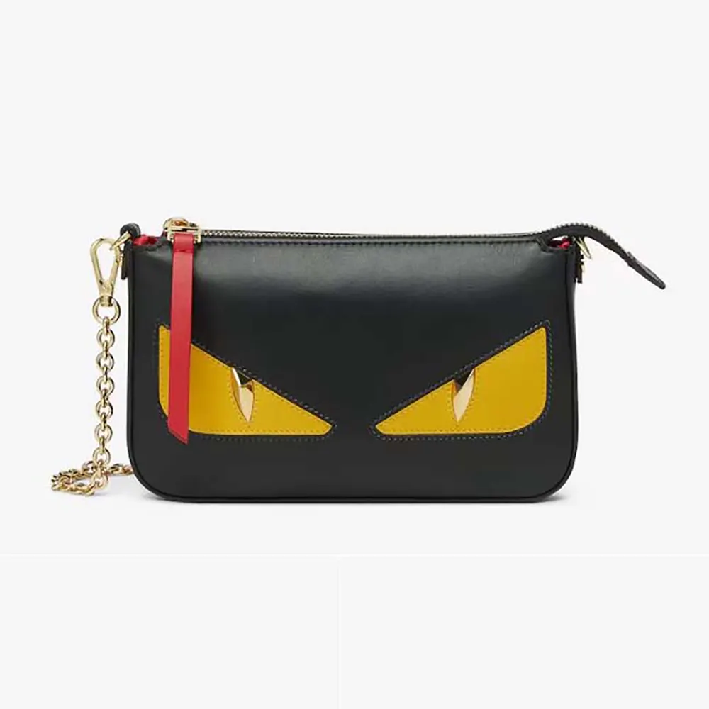 Front view of Fendi Women Baguette Pouch Lunar New Year Black Leather Pouch
