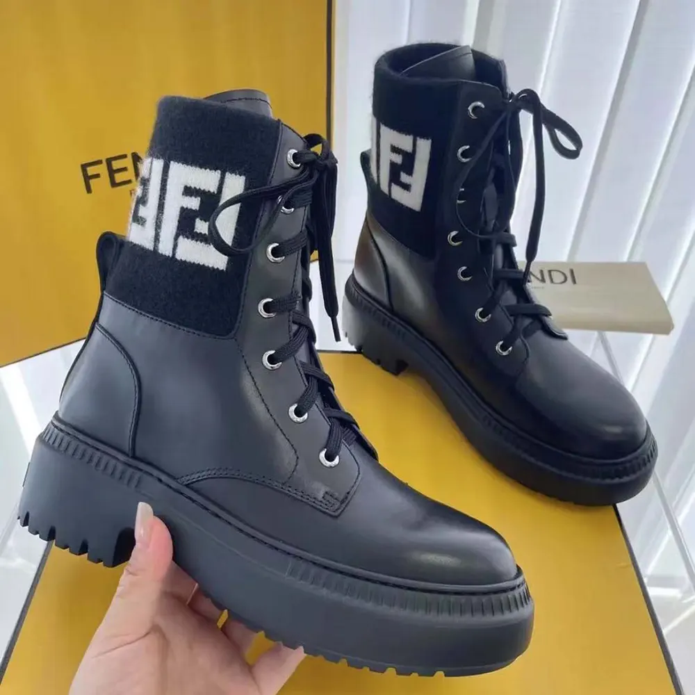 Close-up of FF jacquard motif and silver hardware on Fendi boots
