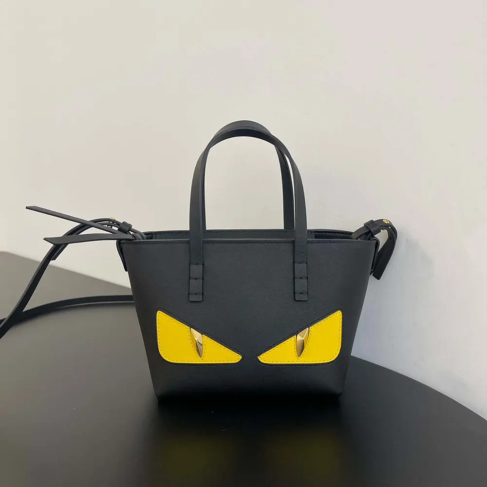 Side profile showing silhouette of Fendi Women Roll Mini Lunar New Year Mini-bag