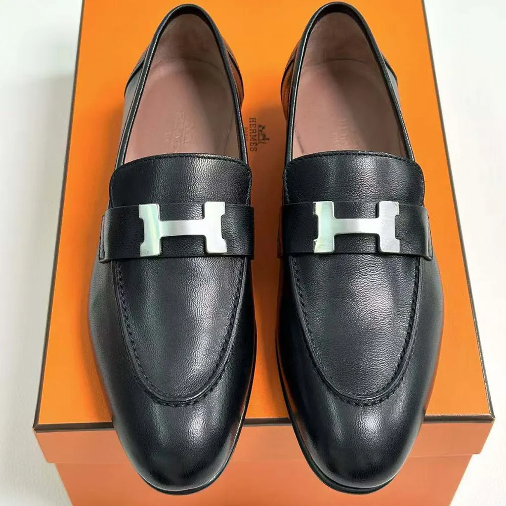 Close-up of palladium plated signature H hardware on Hermes Men Loafer black
