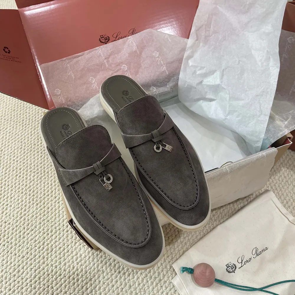 Close-up of signature charm detail on Loro Piana Unisex Babouche Charms loafers