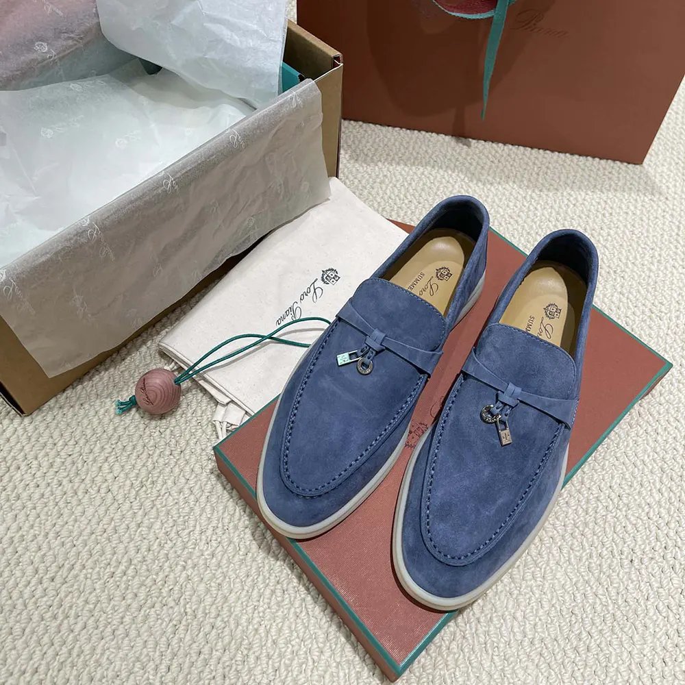 Top view showing navy suede and slip-on design of Loro Piana loafers
