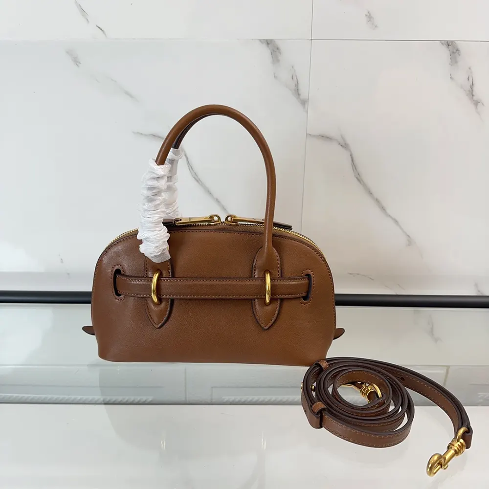 Side angle showing structured silhouette of Miu Miu Women Aventure Bag