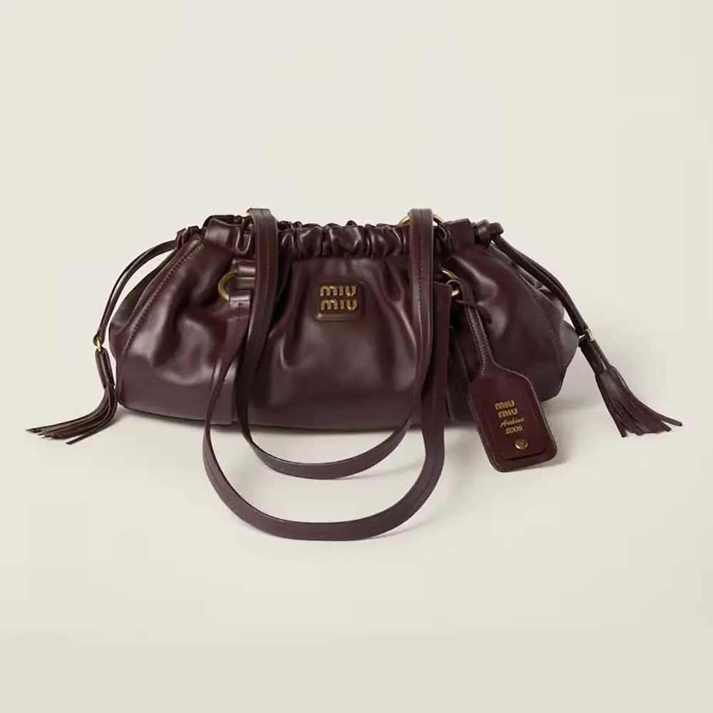 Front view of Miu Miu Women Joie Nappa Leather Bag-Bordeaux showing flap closure