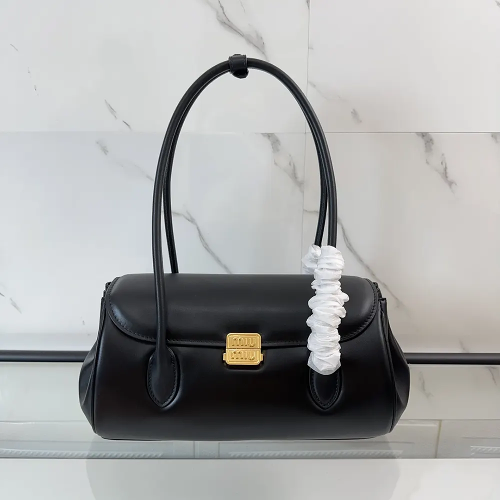 Side angle showing silhouette of Miu Miu Women Leather Shoulder Bag-Black