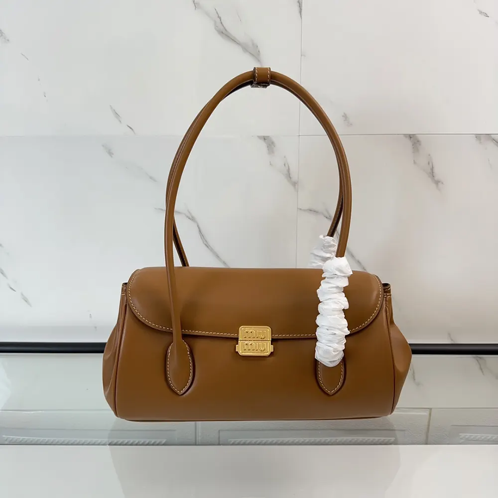 Side angle highlighting smooth brown leather texture on Miu Miu Women Leather Shoulder Bag-Brown