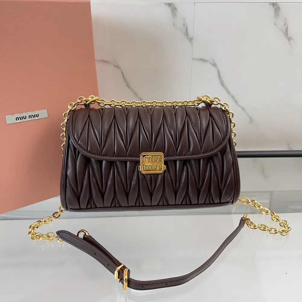 Gold push-lock closure of Miu Miu Women Matelassé Nappa Leather Shoulder Bag-Bordeaux