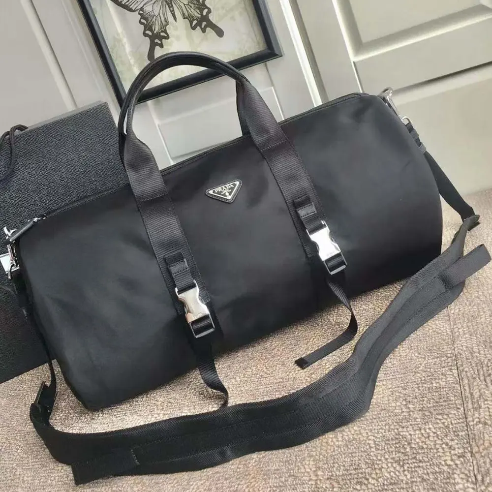Close-up of Saffiano leather and silver hardware on Prada black duffle bag