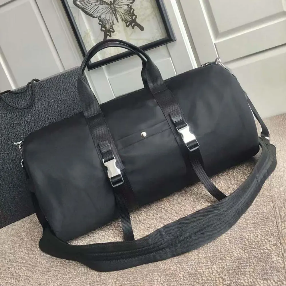 Side angle showing zip closure and compact shape of Prada Re-Nylon duffle