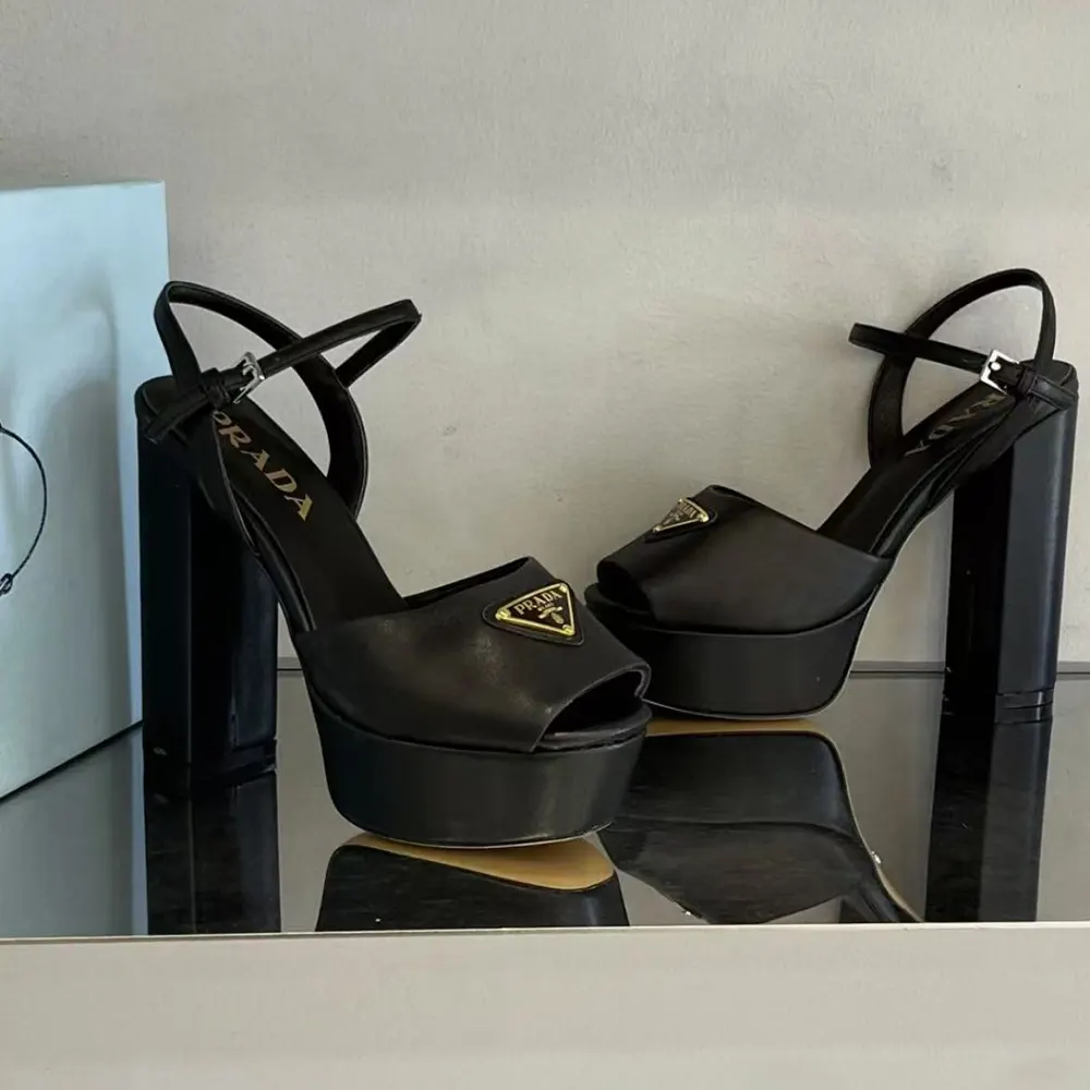 Top-down angle highlighting smooth nappa leather on Prada Women Nappa Leather Platform Sandals-Black