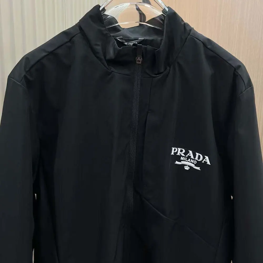 Side profile showing silhouette of Prada Women Re-Nylon Blouson Jacket black