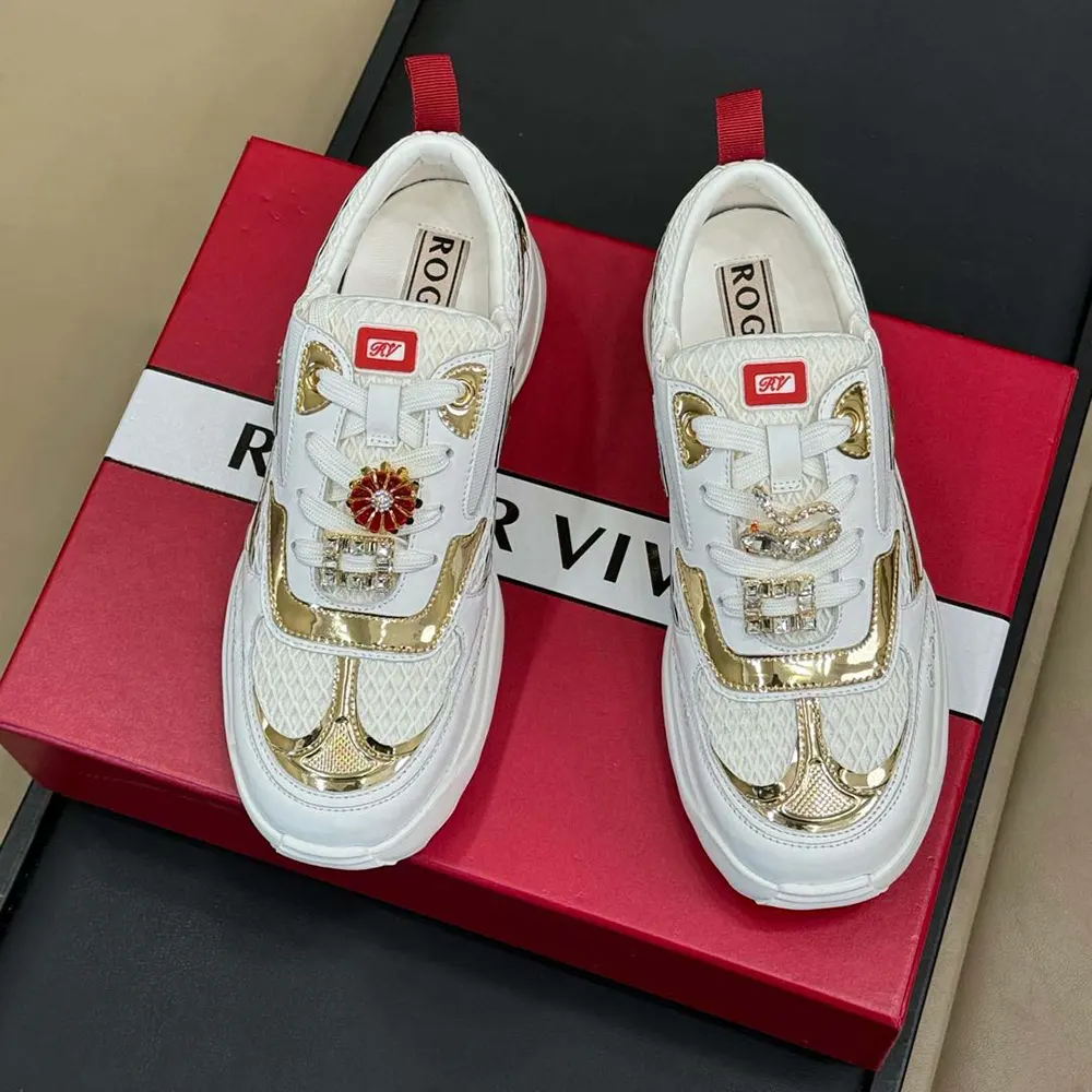 Close-up of signature buckle on Roger Vivier Women Viv’ on the Run Sneakers