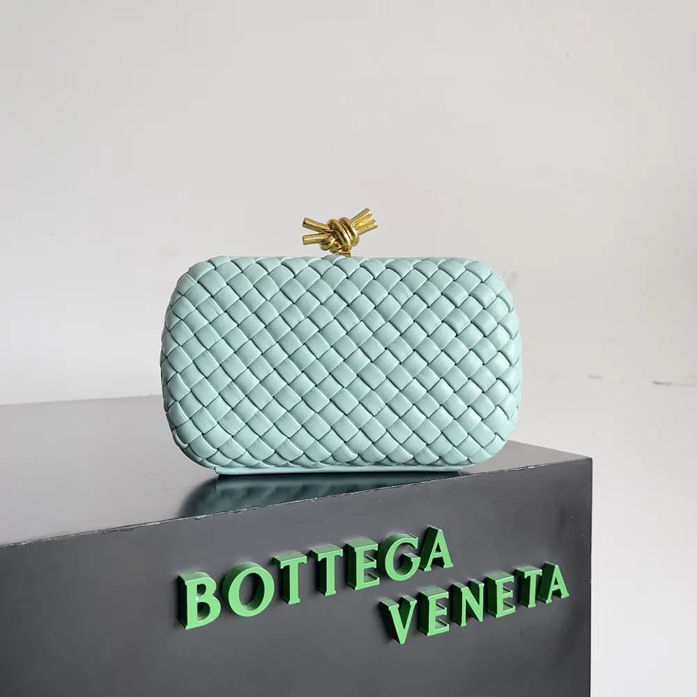Close-up of signature knot clasp on Bottega Veneta Women Knot Minaudière Clutch
