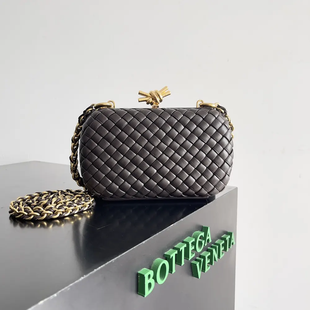 Close-up of silver knot closure on Bottega Veneta Women Knot Minaudière Clutch