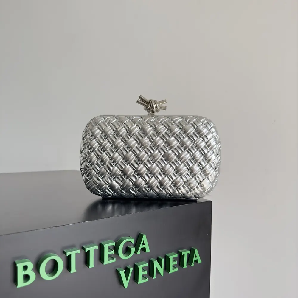 Close-up of silver Knot press hardware on Bottega Veneta Women Knot Minaudiere