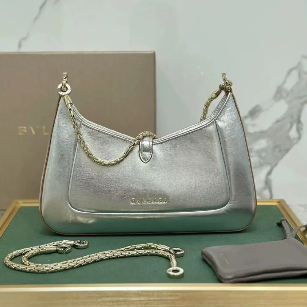 Side angle showing sleek silhouette of Bvlgari Serpenti Baia bag