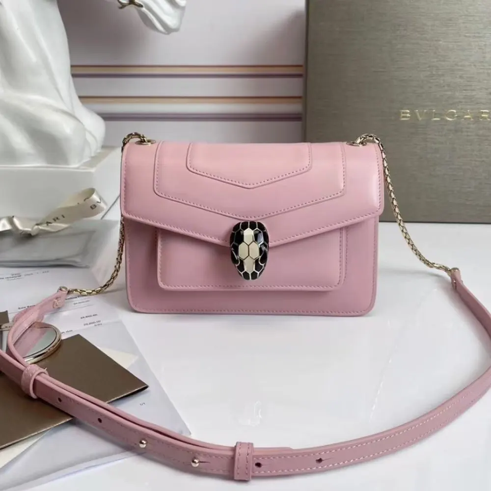 Close-up of snakehead clasp on Bvlgari Women Mini Serpenti Forever Shoulder Bag-Pink