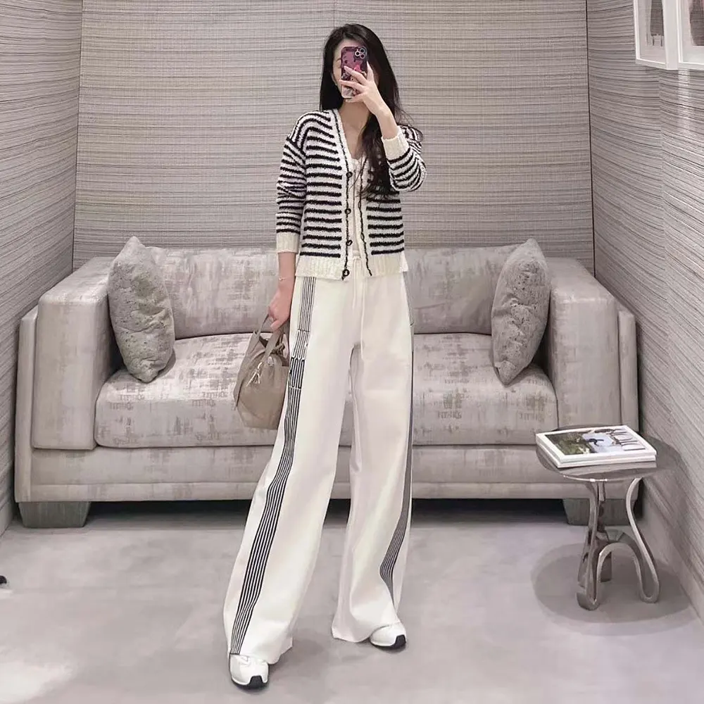 Side profile showing silhouette of Dior Women Flared Pants