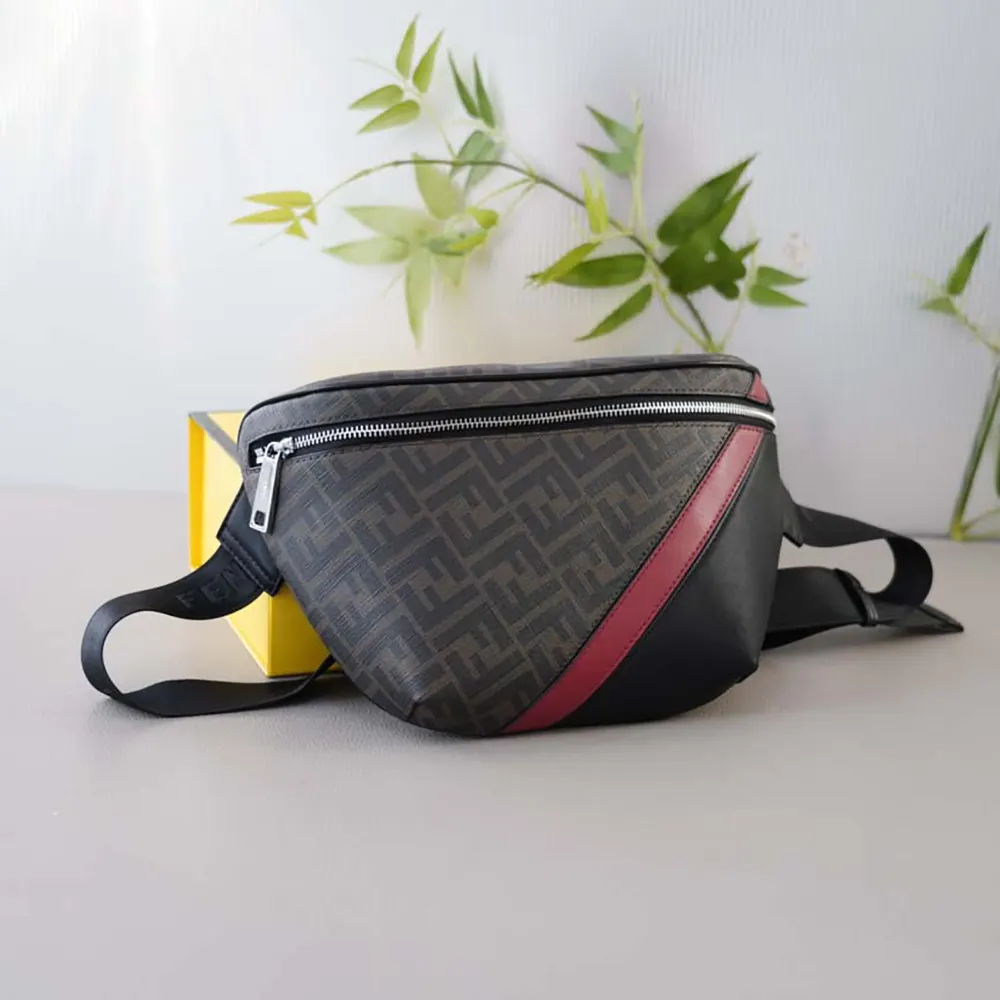 Close-up of silver hardware and red fabric detail on Fendi belt bag