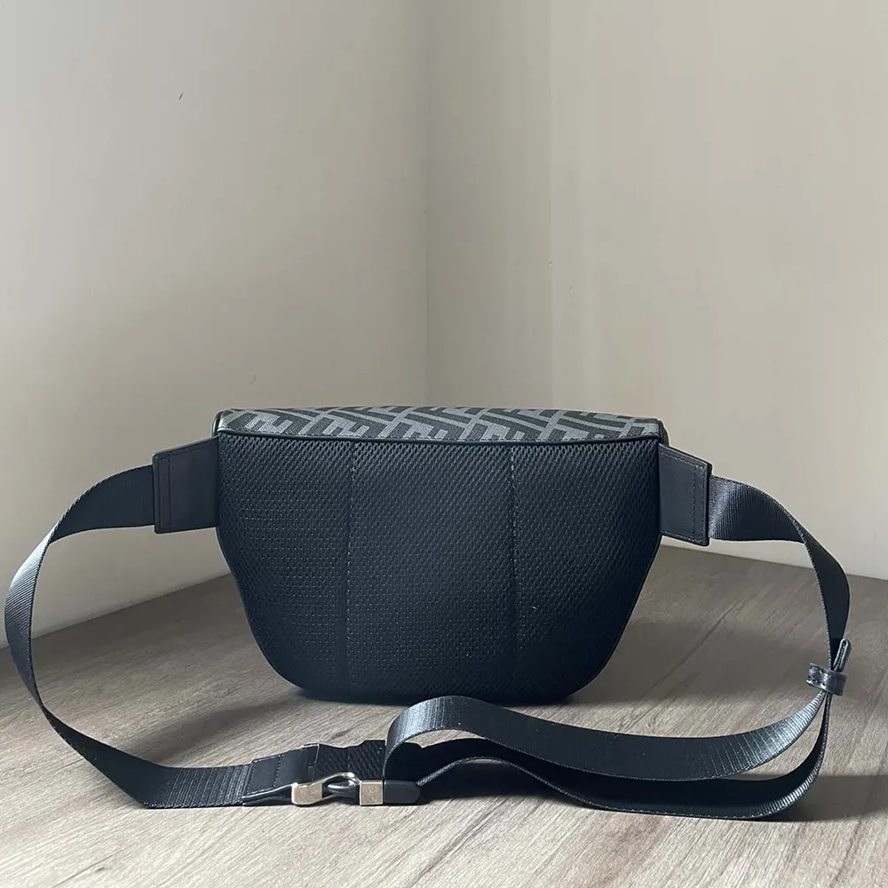 Side profile of Fendi Men Diagonal Belt Bag Leather-Gray highlighting adjustable strap