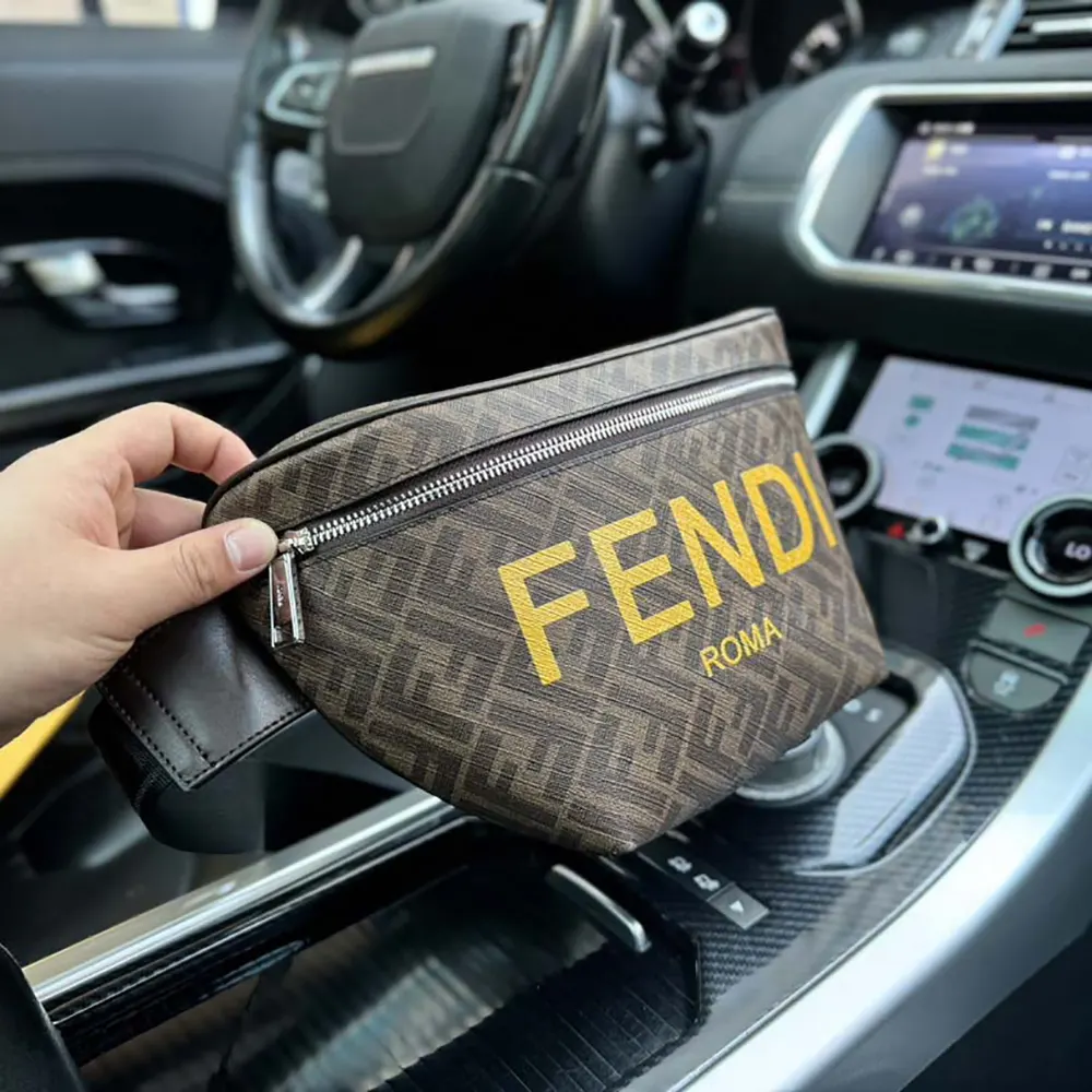 Fendi Men Diagonal Belt Bag Leather-Yellow worn crossbody on male model