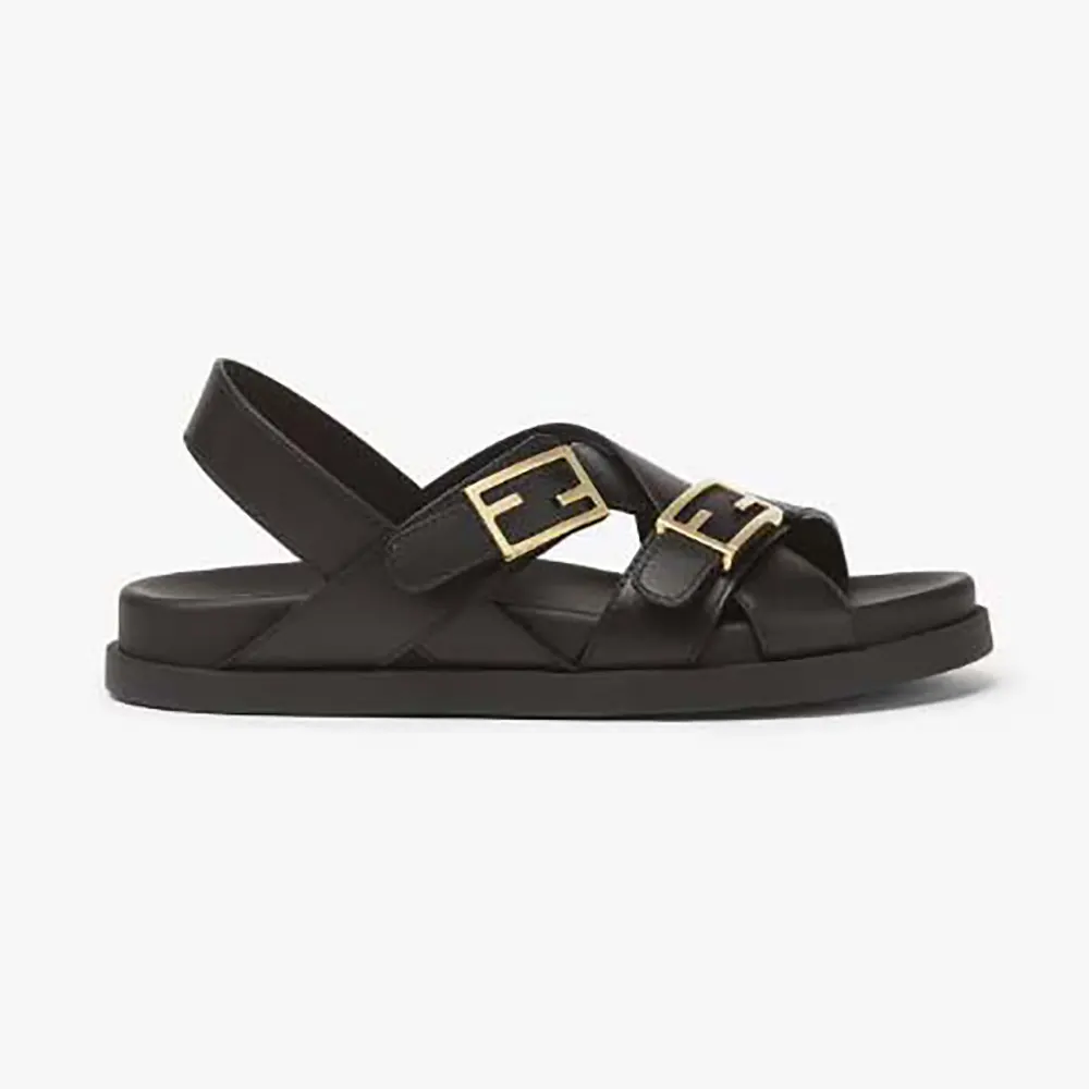 Side view of Fendi Women Feel Black Leather Slides showing sleek silhouette