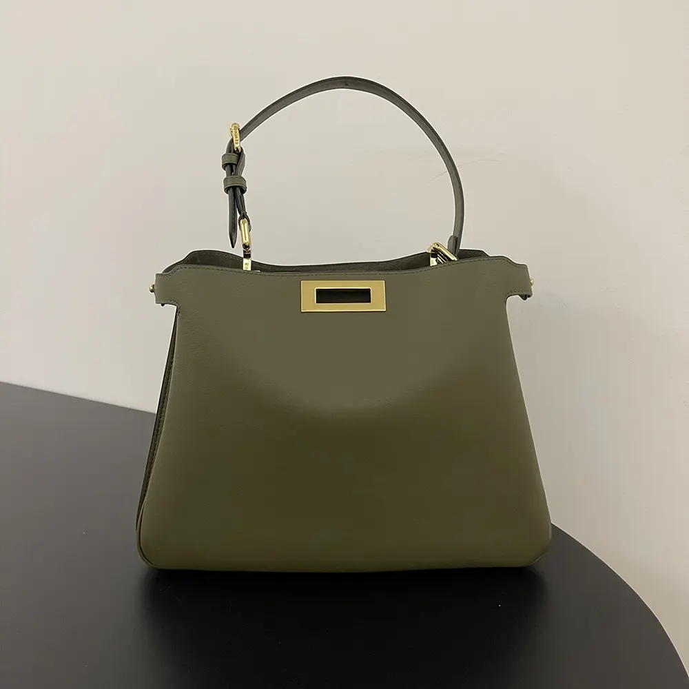 Close-up of gold hardware on Fendi Women Peekaboo Soft Medium Green Leather Bag