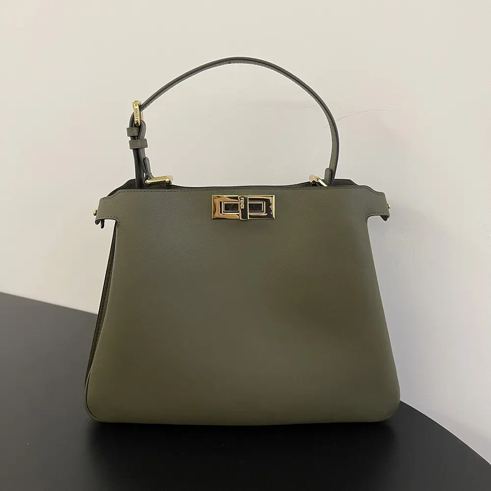Side profile showing double-flap of Fendi Women Peekaboo Soft Medium Green Leather Bag